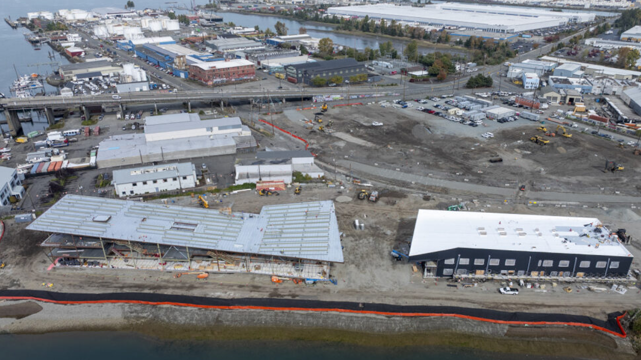 Aerial shot of two buildings under construction side by side.
